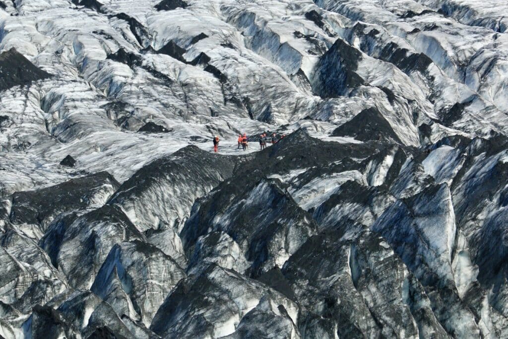 Hikers on Sóleimajökull Glacier