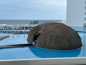 The fascinating Nido restaurant at Viceroy Los Cabos with beach in background